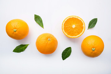 Fresh orange citrus fruit on white background.