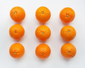 Fresh orange citrus fruit on white background.