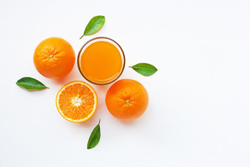 Fresh orange citrus fruit with leaves and Orange juice isolated on white background.  Top view