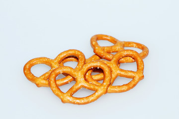 Biscuit. Salted crispy pretzels on a white background.