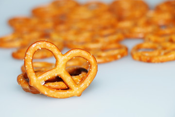 Biscuit. Salted crispy pretzels on a white background.