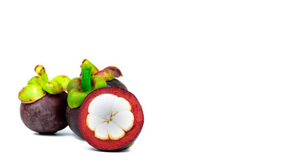 Three whole purple mangosteen and another cross section isolated on white background. Tropical fruit from Thailand. The queen of fruits. Asia fresh fruit market. Natural source of tannin and xanthones