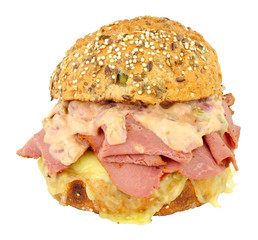 Spicy beef pastrami meat filled sandwich bread roll isolated on a white background