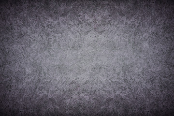 Grey textured concrete wall. Dark edges