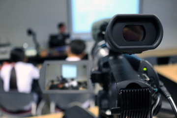 Photographer recording  video lecturer and student learning in classroom of university. - Education...