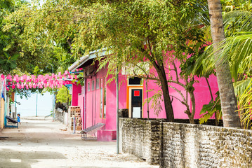 MALE, MALDIVES - NOVEMBER, 27, 2016: View of private buildings. Copy space for text.