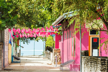MALE, MALDIVES - NOVEMBER, 27, 2016: View of private buildings. Copy space for text.