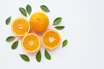 Fototapeta na wymiar Fresh orange citrus fruit with leaves isolated on white backgrou