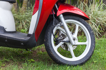 Front end of a red scooter