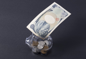 Piggy bank transparent color and stack of money safe