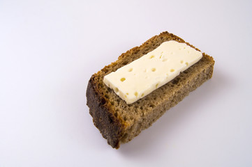 Slice of brynza on black bread