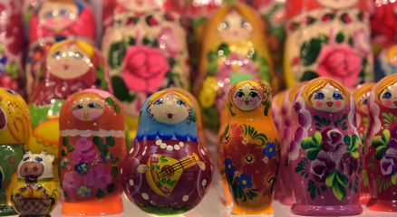 Fototapeta na wymiar Souvenirs with Russian symbols in souvenir shop for tourists, Matryoshki