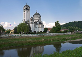Fototapeta premium Orthodox Cathedral in Sighisoara stock images. Holy Trinity Church. View of the town of Sighisoara. Sighisoara Romania. Sighisoara old town. Old houses in Romania. Ancient architecture in Transylvania