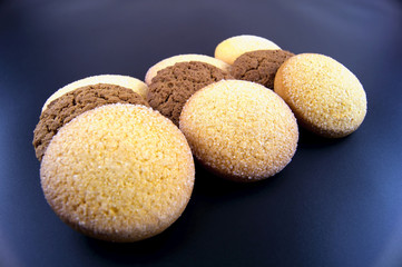 Cookies of corn and oat flour on a dark background