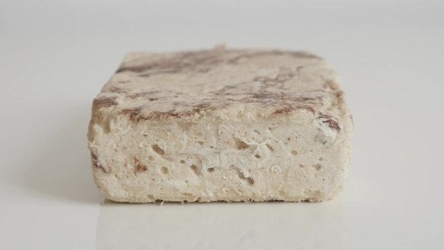 Sesame halva block on white footage