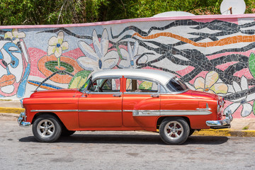 VINALES, CUBA - MAY 13, 2017: American red retro car. Copy space for text.