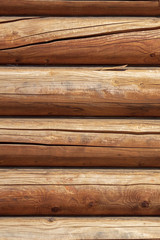 Logs on the wall with a log frame as a background