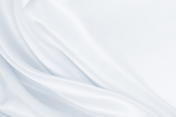 Fototapeta na wymiar Smooth elegant grey silk or satin luxury cloth as wedding background. Luxurious background design