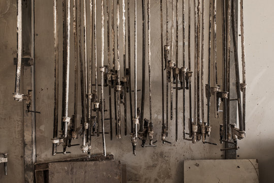 Metal equipment hanging in foundry 