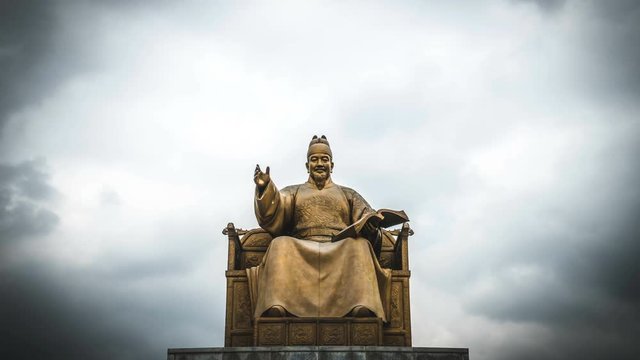 Timelapse of King Sejong Monument against Cloudy Sky at Gwanghwamun Square in Seoul, South Korea