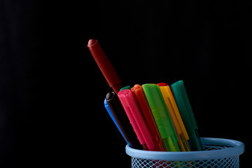 Color Magic in a metal box on a black background.