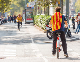 Cyclist at a demonstration in the city center, Barcelona, Catalunya, Spain. Copy space for text.