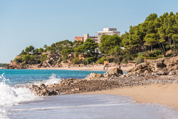 Fototapeta na wymiar MIAMI PLATJA, SPAIN - SEPTEMBER 18, 2017: View of the sandy beach. Copy space for text.