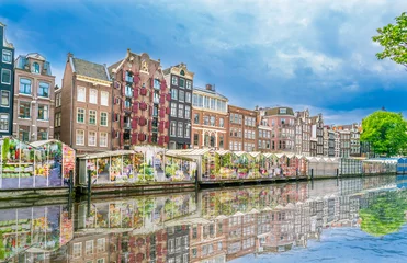 Foto op Plexiglas Amsterdam, The Netherlands May 27 2018 - The Flower market at the Singel Canal in the center of Amsterdam © ivoderooij