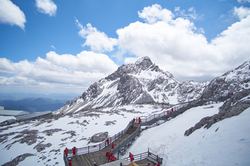 Landscape view of Jade Dragon Snow Mountain Peak with path way. It is famous place in China for...