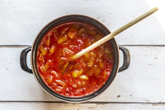 Homemade tomato rhubarb ketchup in cooking pot - Powered by Adobe