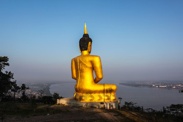 Golden big Buddha and Mekong view in Champasak, Laos