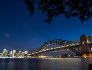 Fototapeta na wymiar Sydney Harbour Bridge and Skyline. Illuminated by the Vivid Festival lights. 2018.