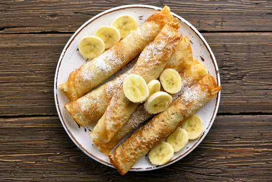 Crepes roll with banana slices