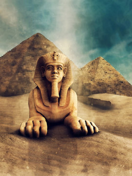 Egipski sfinks na tle piramid na pustyni