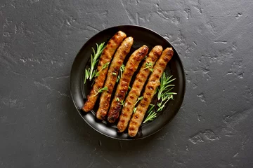 Foto auf Acrylglas Grilled sausage, top view © voltan