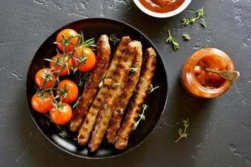 Grilled sausage and cherry tomatoes