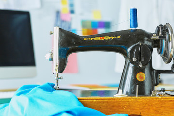 Empty workroom and workplace of tailor or vendor of clothes in small boutique