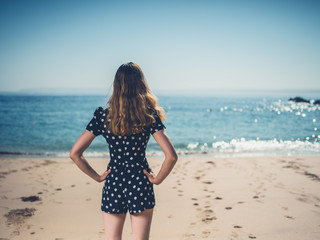 Beautiful young woman  on the beach