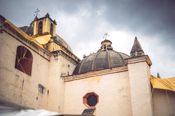 Exterior view of church against cloudy sky