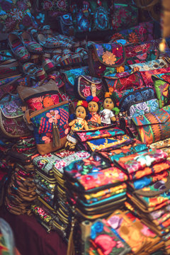 Colorful bags on market stall