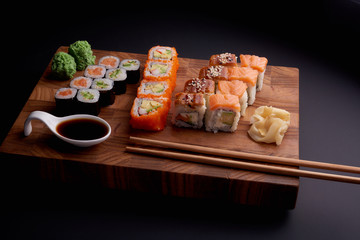 Sushi set on a wooden background for japanese restaurant