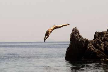 woman jumps to the sea