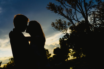 Couple with cloud sky backlight