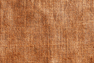 Cotton fabric texture in orange color.