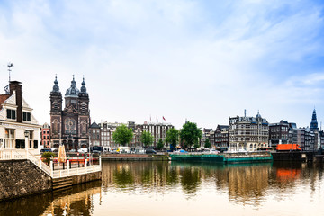 Fototapeta na wymiar Amsterdam, Netherlands - May 23, 2018 : Beautiful street view of Traditional old buildings in Amsterdam,Netherlands