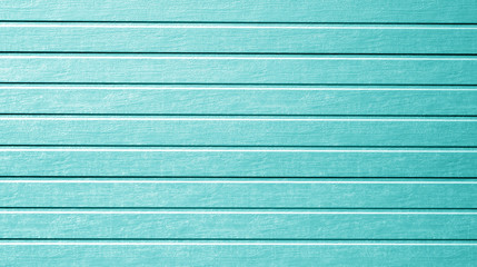 Plastic siding wall texture in cyan color.