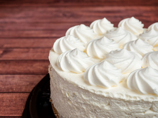 Delicious light ice cream cake with roses cream