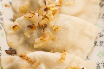 Polish pierogi filled with cabbage and mushrooms