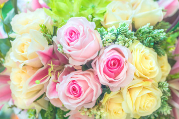 Colorful fabric roses flower decoration for background in a wedding reception