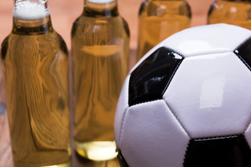 Closeup of soccer ball and fresh beer. Beer Football
